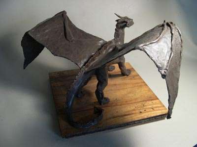 Металическая статуэтка с дракончиком