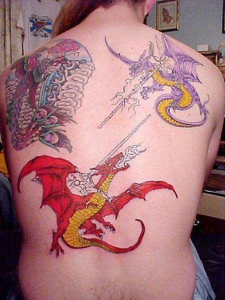 Сражение драконовых всадников - тату на всю спину